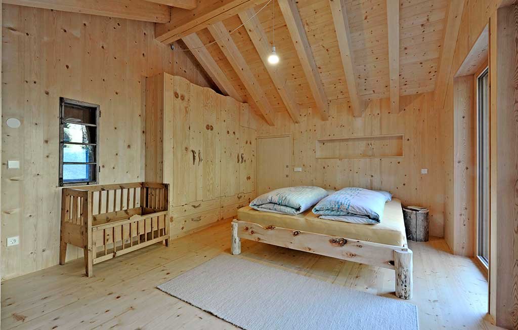 casa vacanze legno camera letto
