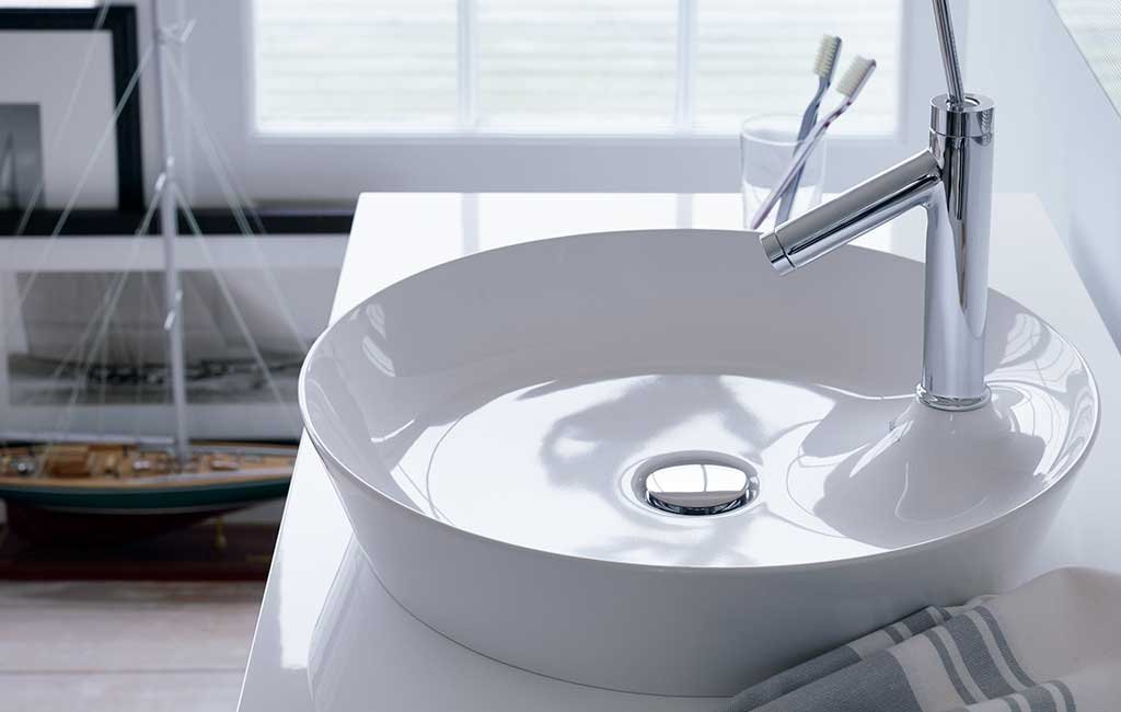 lavabo appoggio tondo rubinetto