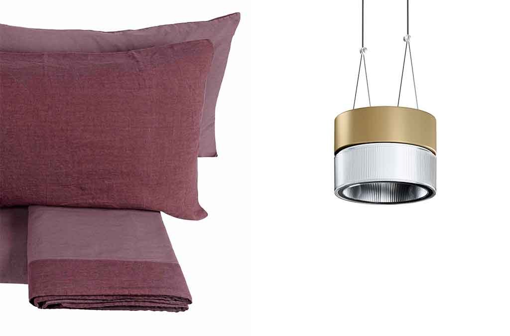 tessuti letto lino e lampada sospesa