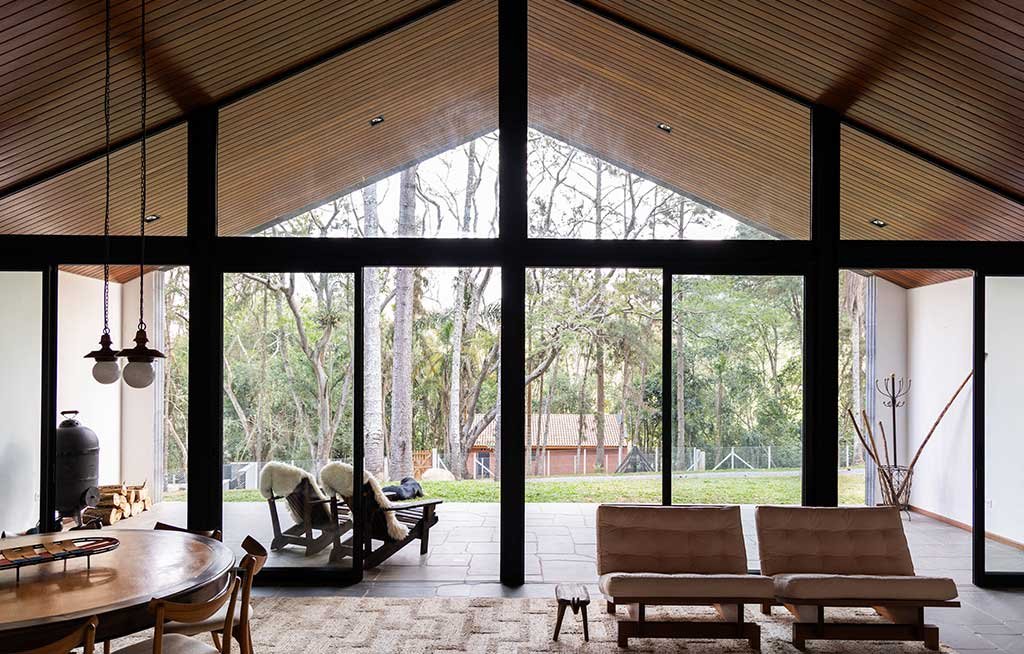 glass wall living room Brazilian chalet
