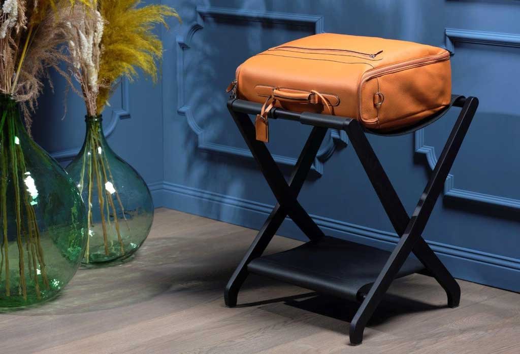 Single black wooden luggage rack