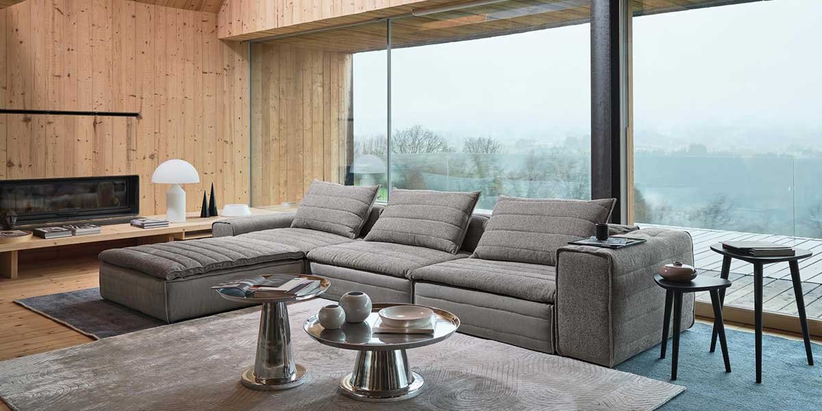 divano-angolare-tessuto-imbottito